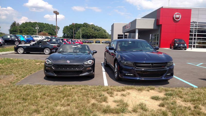 For size reference, the Charger parked next to a 124.